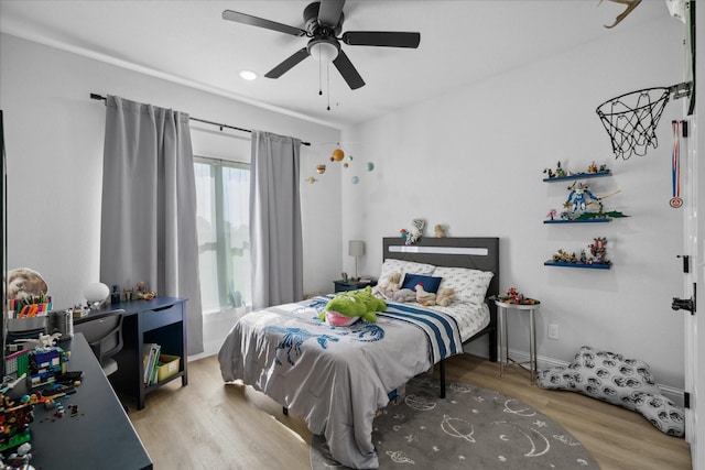 12457 Maplewood Dr, Lindale, TX 75771 - bedroom with wood finished floors and a ceiling fan