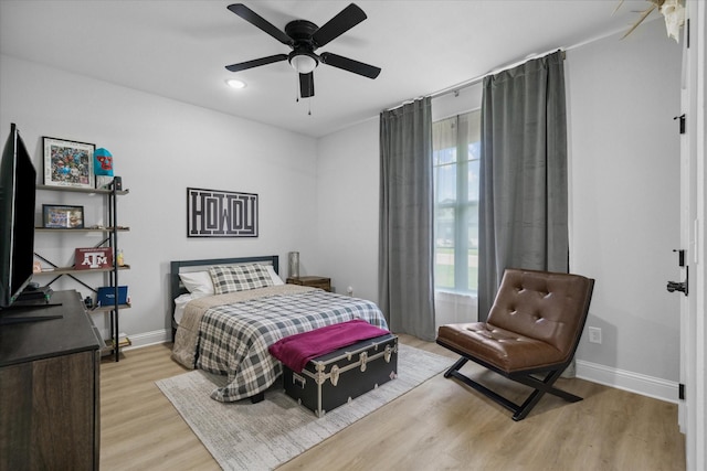 12457 Maplewood Dr, Lindale, TX 75771 - bedroom with light wood finished floors, multiple windows, ceiling fan, and recessed lighting