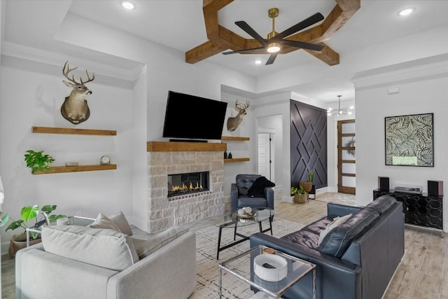 12457 Maplewood Dr, Lindale, TX 75771 - living area with a ceiling fan, a stone fireplace, wood finished floors, recessed lighting, and coffered ceiling