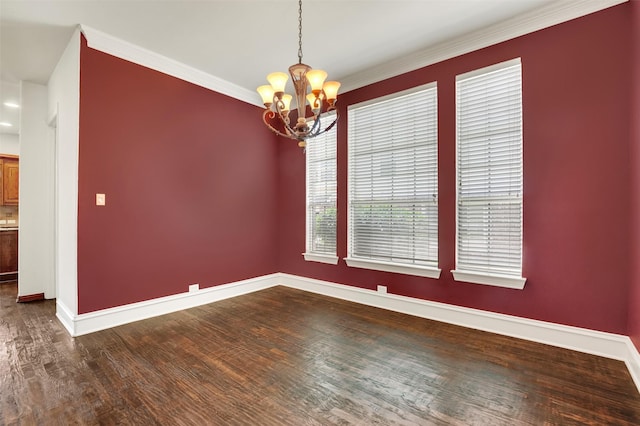 1910 Saint Johns Ave, Allen, TX 75002 - spare room with a chandelier, wood finished floors, and ornamental molding