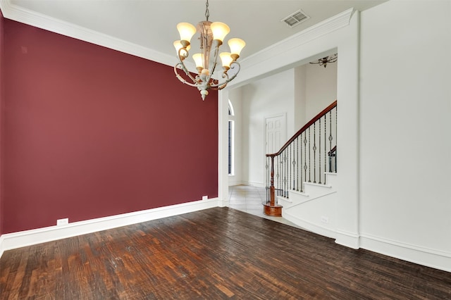 1910 Saint Johns Ave, Allen, TX 75002 - empty room featuring a chandelier, wood finished floors, stairway, and ornamental molding