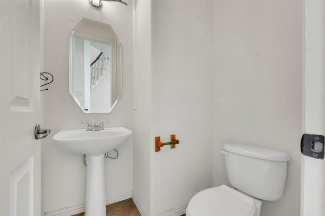 1910 Saint Johns Ave, Allen, TX 75002 - half bath featuring toilet and tile patterned floors