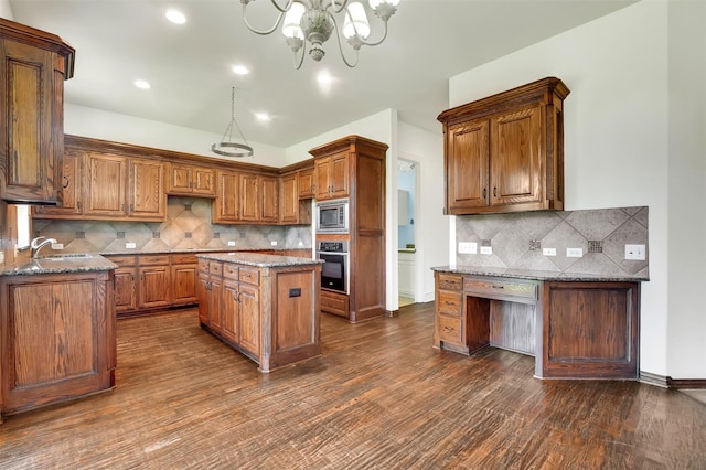 1910 Saint Johns Ave, Allen, TX 75002 - kitchen featuring appliances with stainless steel finishes, tasteful backsplash, dark wood-type flooring, stone counters, and recessed lighting