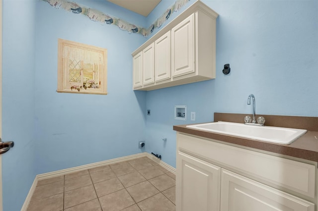 1910 Saint Johns Ave, Allen, TX 75002 - laundry area featuring cabinet space, hookup for an electric dryer, hookup for a washing machine, light tile patterned floors, and gas dryer hookup