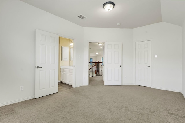 1910 Saint Johns Ave, Allen, TX 75002 - unfurnished bedroom with carpet flooring and vaulted ceiling