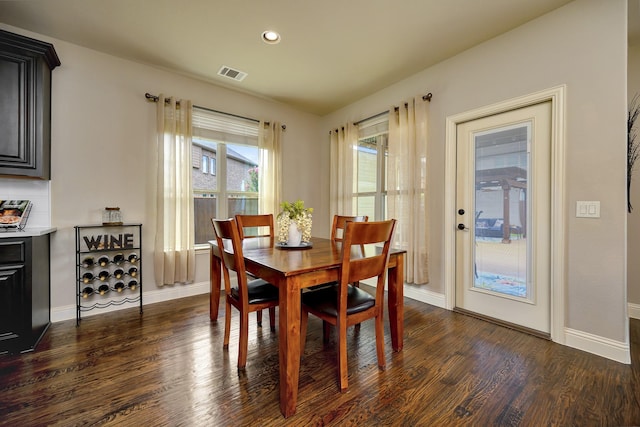7219 Brisa Rd, Grand Prairie, TX 75054 - dining space featuring dark wood finished floors and recessed lighting