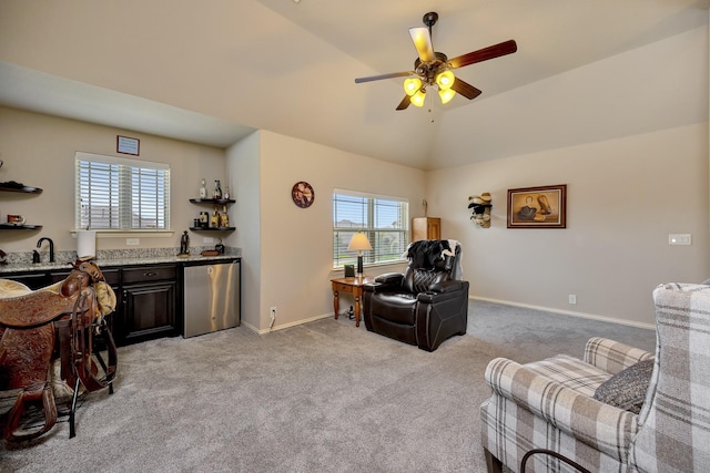 7219 Brisa Rd, Grand Prairie, TX 75054 - living room featuring lofted ceiling, a ceiling fan, healthy amount of natural light, light carpet, and wet bar