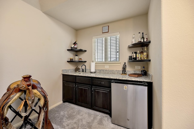 7219 Brisa Rd, Grand Prairie, TX 75054 - indoor bar with fridge and light carpet