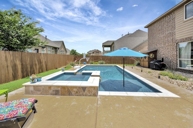 7219 Brisa Rd, Grand Prairie, TX 75054 - view of pool with a fenced backyard, a pool with connected hot tub, area for grilling, and a residential view