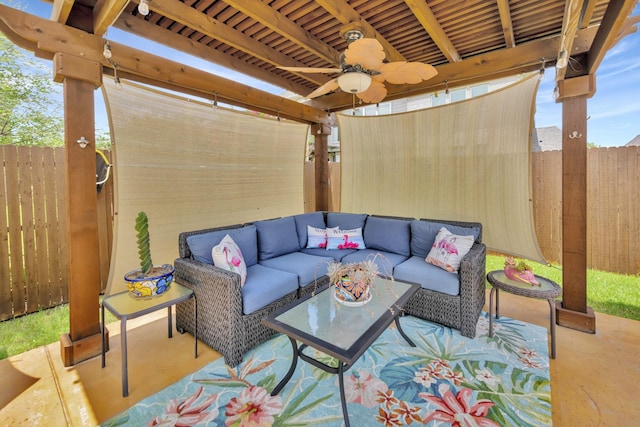 7219 Brisa Rd, Grand Prairie, TX 75054 - fenced backyard with outdoor lounge area and ceiling fan
