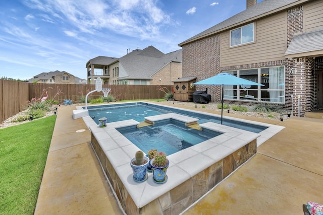 7219 Brisa Rd, Grand Prairie, TX 75054 - view of swimming pool with a fenced backyard, a storage shed, a pool with connected hot tub, a patio, and a residential view