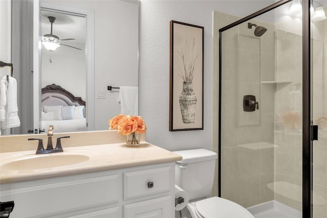 1400 Lakeside Dr, Prosper, TX 75078 - full bathroom with connected bathroom, vanity, a shower stall, and ceiling fan