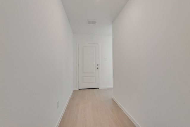 1657 Crested Way, Fort Worth, TX 76140 - corridor featuring light wood-type flooring and baseboards