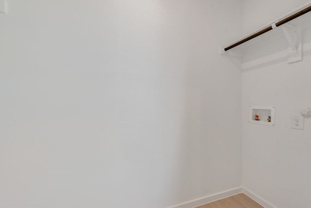 1657 Crested Way, Fort Worth, TX 76140 - washroom featuring washer hookup and light wood finished floors