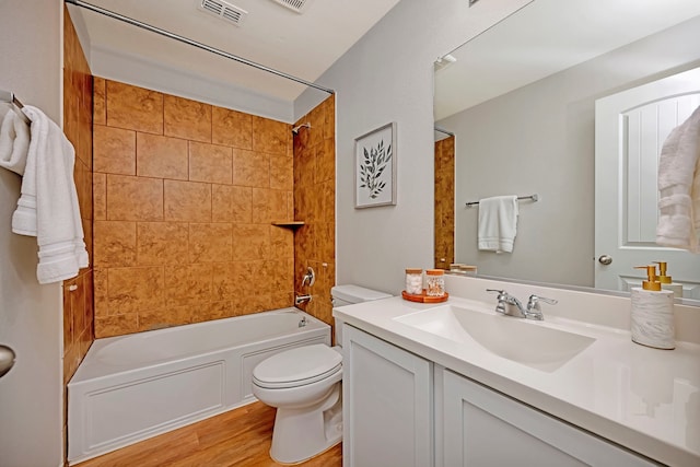 5361 Brentlawn Dr, Fort Worth, TX 76179 - bathroom featuring vanity, wood finished floors, and tub / shower combination