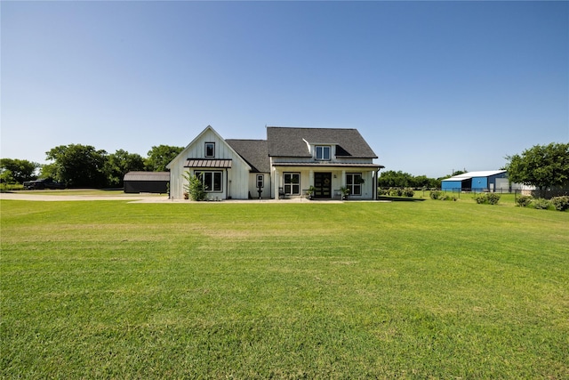 4220 County Road 703, Alvarado, TX 76009 - modern inspired farmhouse with board and batten siding and a front lawn