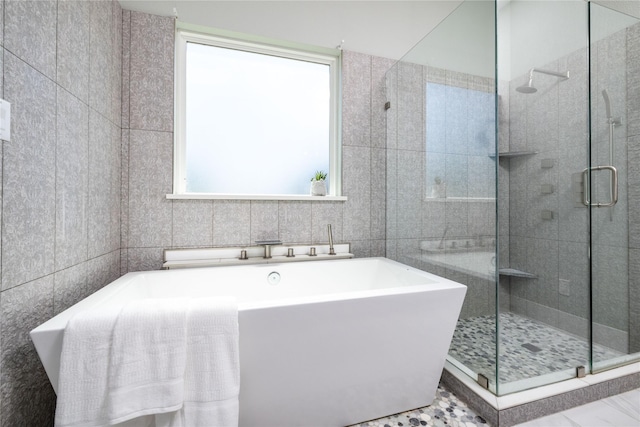4220 County Road 703, Alvarado, TX 76009 - full bath with a freestanding tub, a stall shower, and tile walls