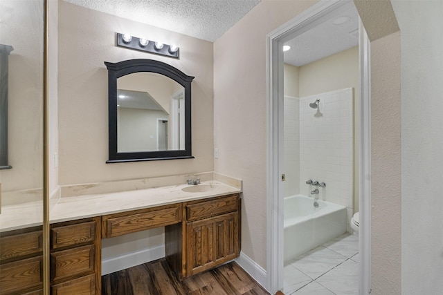 1037 Alicia Ln, Lancaster, TX 75134 - full bath featuring vanity,  shower combination, a textured ceiling, and wood finished floors