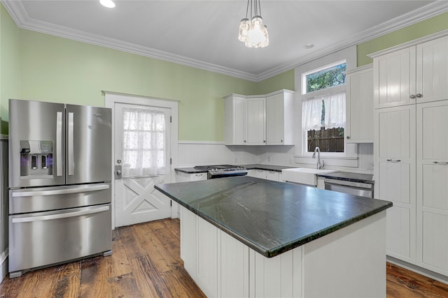 401 N Benge, Mckinney, TX 75069 - kitchen with stainless steel appliances, white cabinetry, dark countertops, dark wood-style flooring, and crown molding