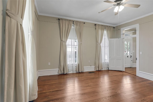 401 N Benge, Mckinney, TX 75069 - empty room with hardwood / wood-style flooring, crown molding, and a ceiling fan