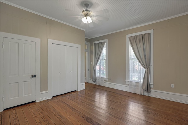 401 N Benge, Mckinney, TX 75069 - unfurnished bedroom with hardwood / wood-style flooring, ornamental molding, a ceiling fan, and a closet