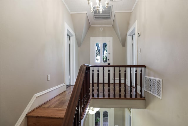 401 N Benge, Mckinney, TX 75069 - staircase with ornamental molding, wood finished floors, and a chandelier