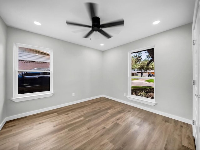 3505 Morningstar Ln, Farmers Branch, TX 75234 - empty room with wood finished floors, ceiling fan, and recessed lighting