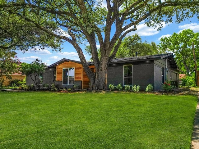 3505 Morningstar Ln, Farmers Branch, TX 75234 - view of front of home with a front yard and brick siding