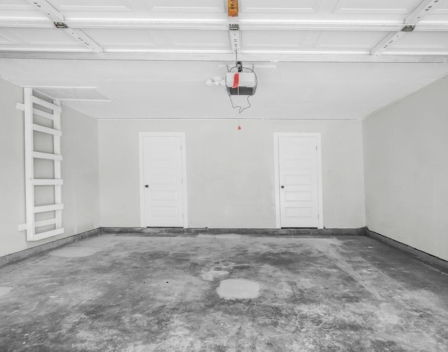 3505 Morningstar Ln, Farmers Branch, TX 75234 - garage featuring a garage door opener and baseboards