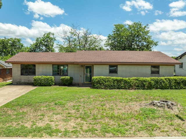 301 Sunset Blvd, Hewitt, TX 76643 - ranch-style house with brick siding and a front lawn