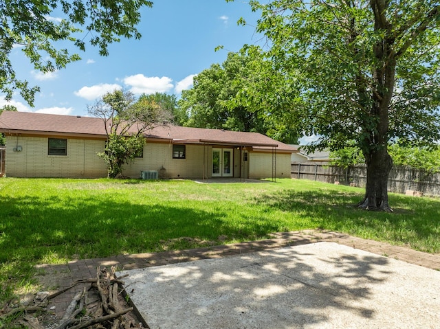 301 Sunset Blvd, Hewitt, TX 76643 - rear view of property featuring a patio, french doors, and brick siding
