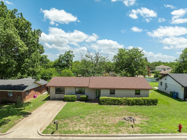 301 Sunset Blvd, Hewitt, TX 76643 - ranch-style home featuring concrete driveway, brick siding, and a front yard