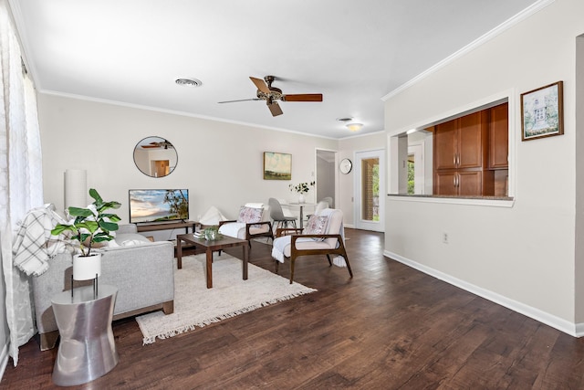 301 Sunset Blvd, Hewitt, TX 76643 - living room with dark wood-style floors, ceiling fan, and ornamental molding