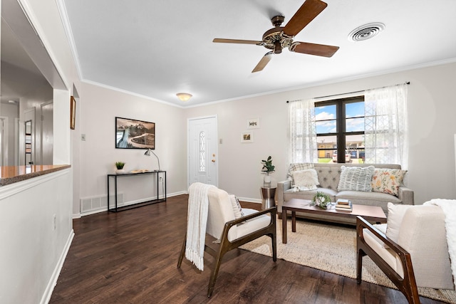 301 Sunset Blvd, Hewitt, TX 76643 - living room with dark wood finished floors, ceiling fan, and ornamental molding