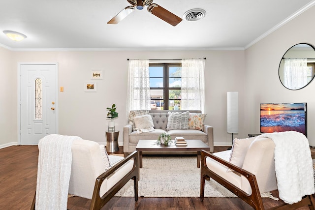 301 Sunset Blvd, Hewitt, TX 76643 - living area with crown molding, a ceiling fan, and dark wood-style floors