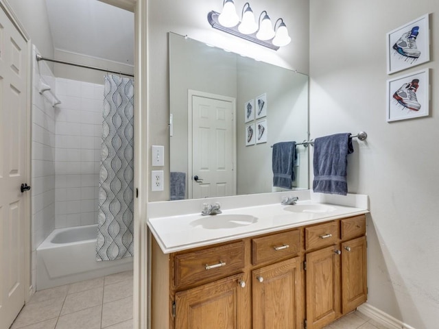 6505 Tamarron Ln, Plano, TX 75024 - bathroom with tile patterned floors, double vanity, and shower / bath combo with shower curtain