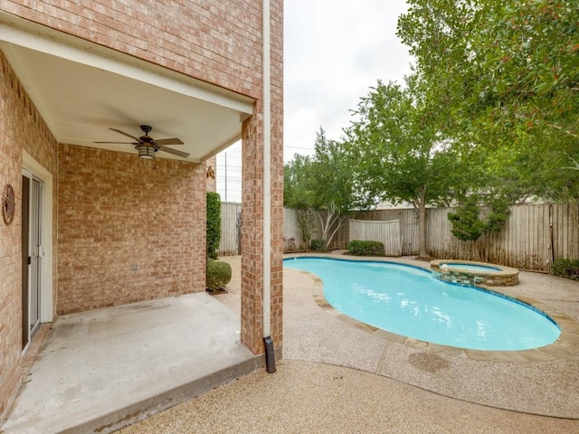 6505 Tamarron Ln, Plano, TX 75024 - view of pool featuring ceiling fan, a patio, a fenced backyard, and a pool with connected hot tub