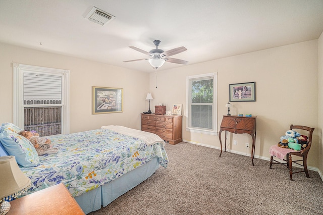 504 Harrison Ln, Hurst, TX 76053 - bedroom with carpet and a ceiling fan