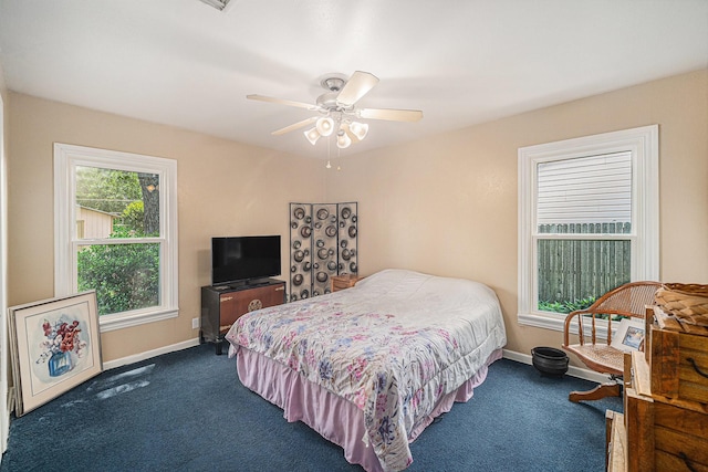 504 Harrison Ln, Hurst, TX 76053 - bedroom featuring carpet flooring and a ceiling fan
