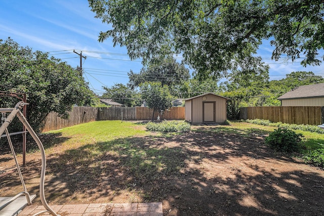 504 Harrison Ln, Hurst, TX 76053 - fenced backyard featuring a storage shed