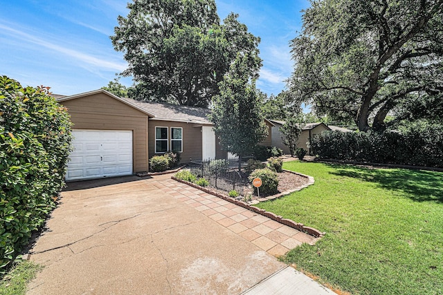 504 Harrison Ln, Hurst, TX 76053 - ranch-style home with concrete driveway, a front lawn, and an attached garage
