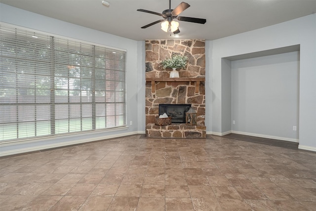 4748 Mcbreyer Pl, Fort Worth, TX 76244 - unfurnished living room with a ceiling fan and a stone fireplace