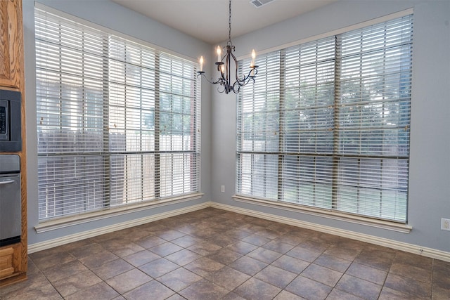 4748 Mcbreyer Pl, Fort Worth, TX 76244 - unfurnished dining area with a chandelier and baseboards