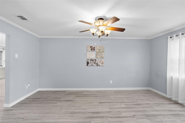 1914 Normandy Dr, Irving, TX 75060 - empty room featuring a ceiling fan, crown molding, and light wood-style floors