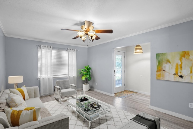 1914 Normandy Dr, Irving, TX 75060 - living area featuring ceiling fan, wood finished floors, and ornamental molding