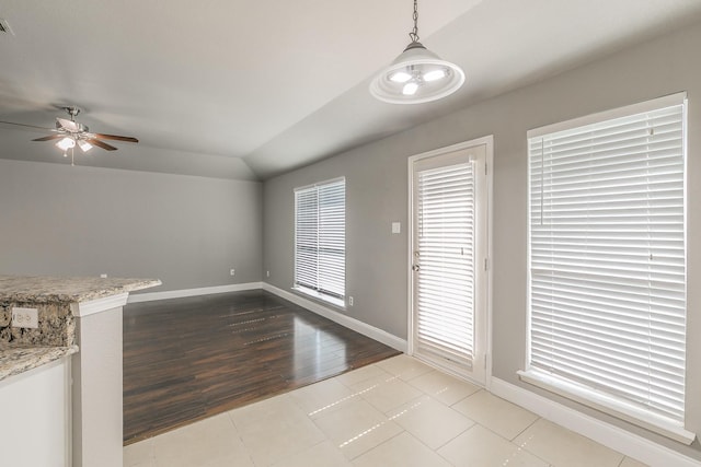 1102 David Dr, Euless, TX 76040 - unfurnished dining area with ceiling fan, wood finished floors, and lofted ceiling