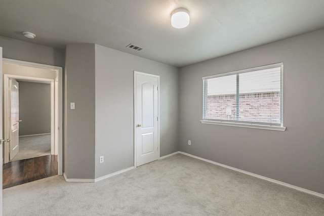 1102 David Dr, Euless, TX 76040 - unfurnished bedroom featuring carpet and baseboards