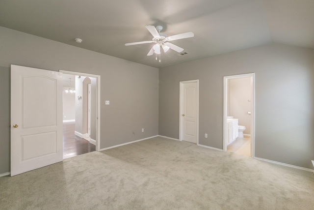 1102 David Dr, Euless, TX 76040 - unfurnished bedroom featuring carpet flooring, ensuite bathroom, lofted ceiling, a ceiling fan, and arched walkways