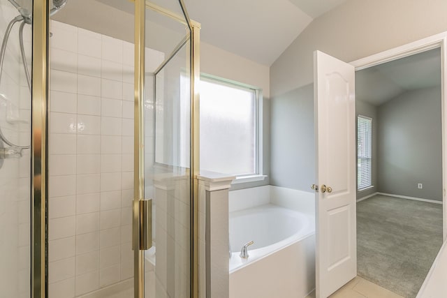 1102 David Dr, Euless, TX 76040 - full bathroom with a bath, a stall shower, and lofted ceiling