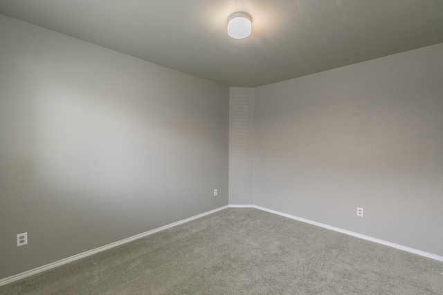 1102 David Dr, Euless, TX 76040 - carpeted empty room with baseboards